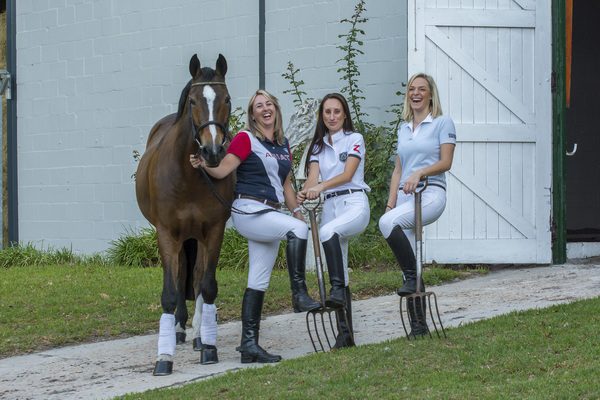 Three ladies with a horse